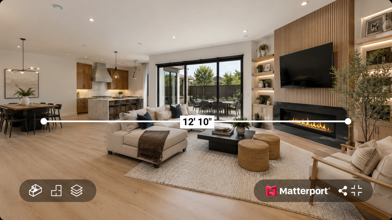Matterport measurement mode showing room width in a staged living room