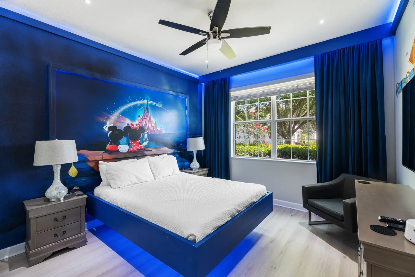 Bedroom with blue accent lighting photographed for a New York City real estate listing.